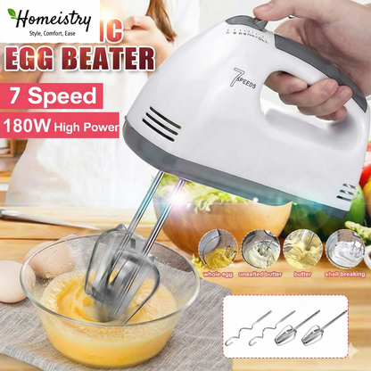 Handheld electric egg beater with attachments being used to mix eggs, featuring Homeistry branding.