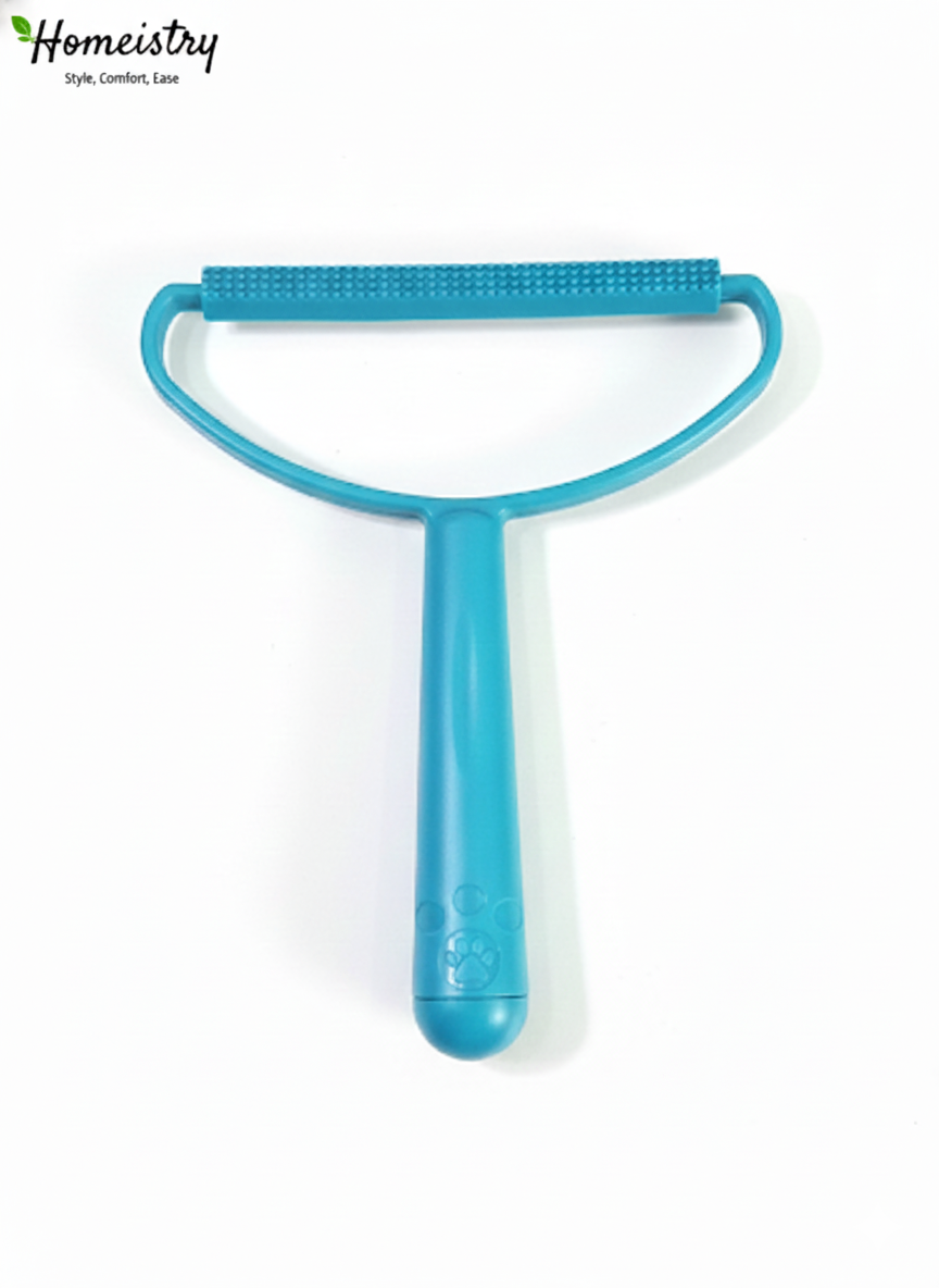 Close-up of the textured grooming side of the blue lint remover tool.