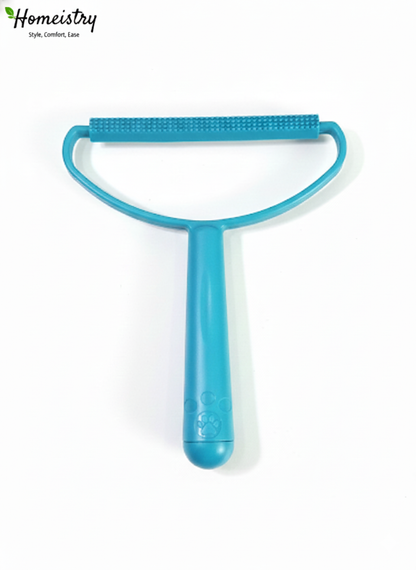 Close-up of the textured grooming side of the blue lint remover tool.