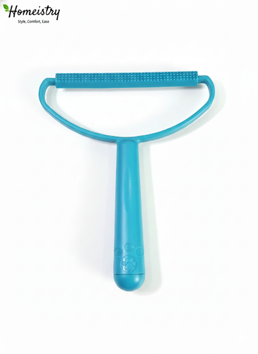 Close-up of the textured grooming side of the blue lint remover tool.