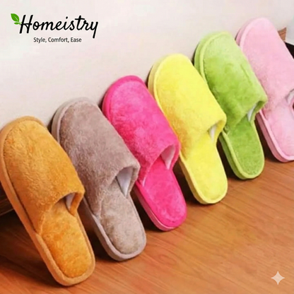 Colorful slippers on a wooden floor with 'Homeistry' branding.