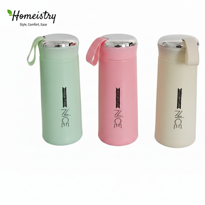 Group shot of colorful Homeistry thermal flasks standing in a row.