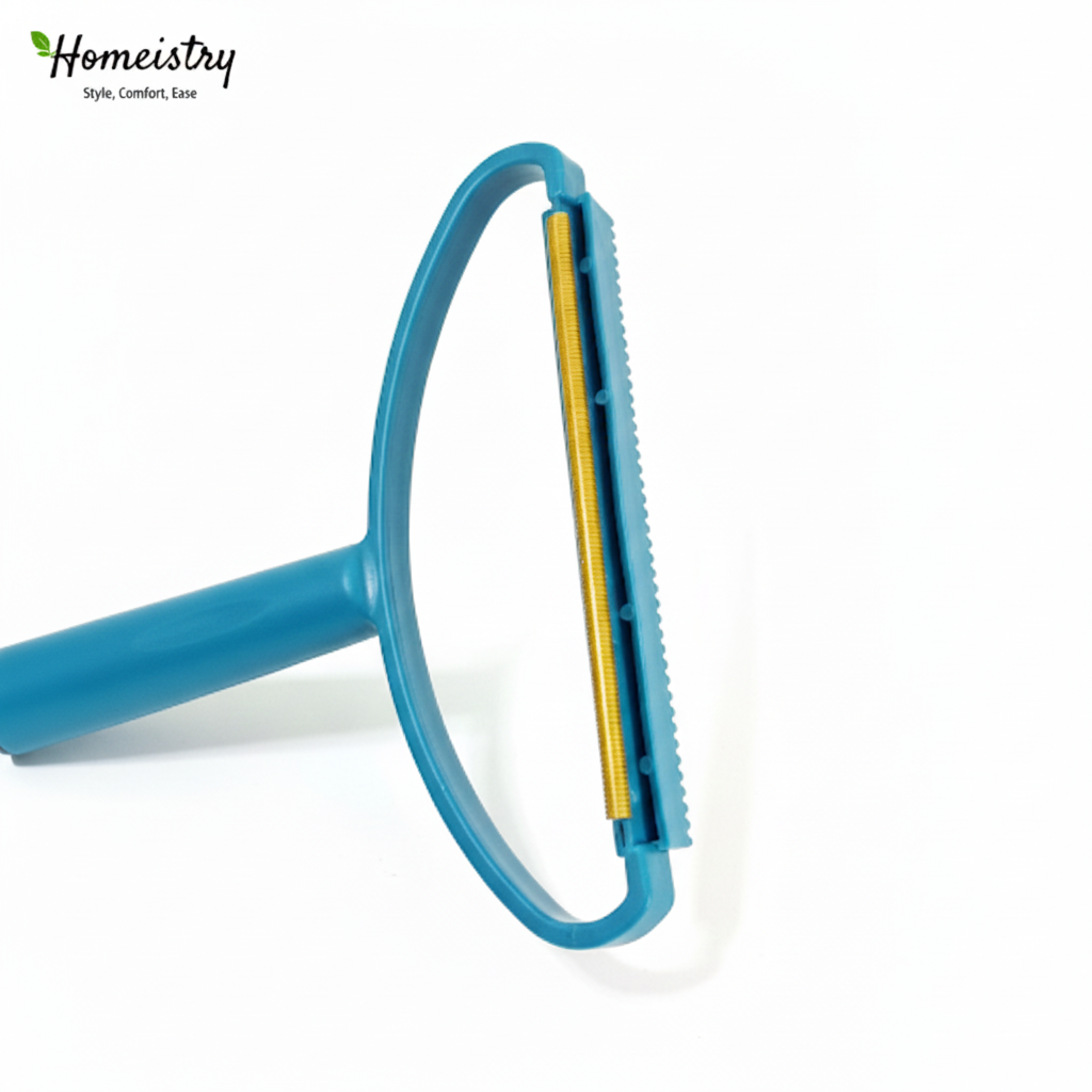 Side view of the blue lint remover showing the copper blade and comb teeth profile.