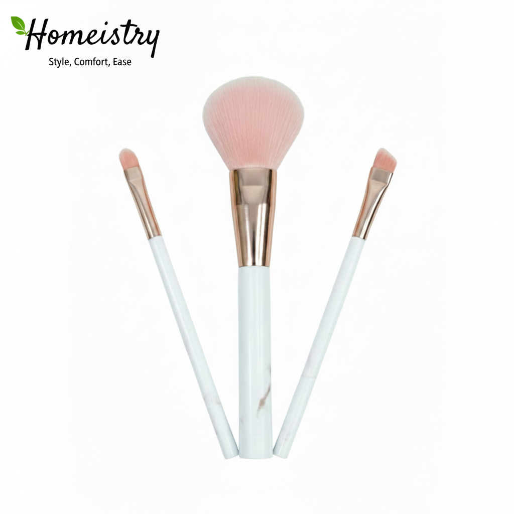 Three makeup brushes with pink bristle heads on white background, branded 'Homeistry'.