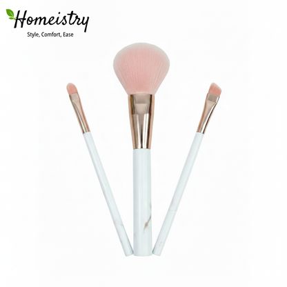 Three makeup brushes with pink bristle heads on white background, branded 'Homeistry'.