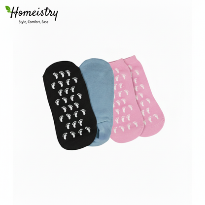 Three pairs of Homeistry gel socks in black, blue, and pink arranged together.