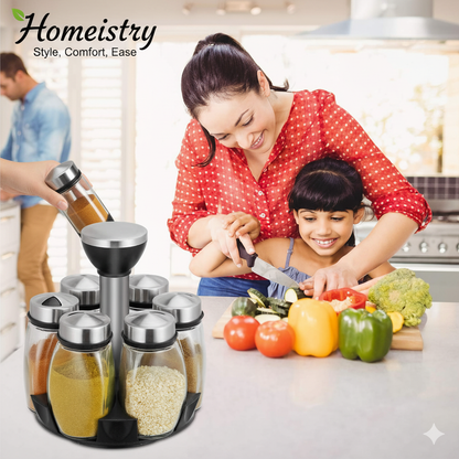 Woman and child in a kitchen with a spice rack and vegetables, Homeistry brand visible