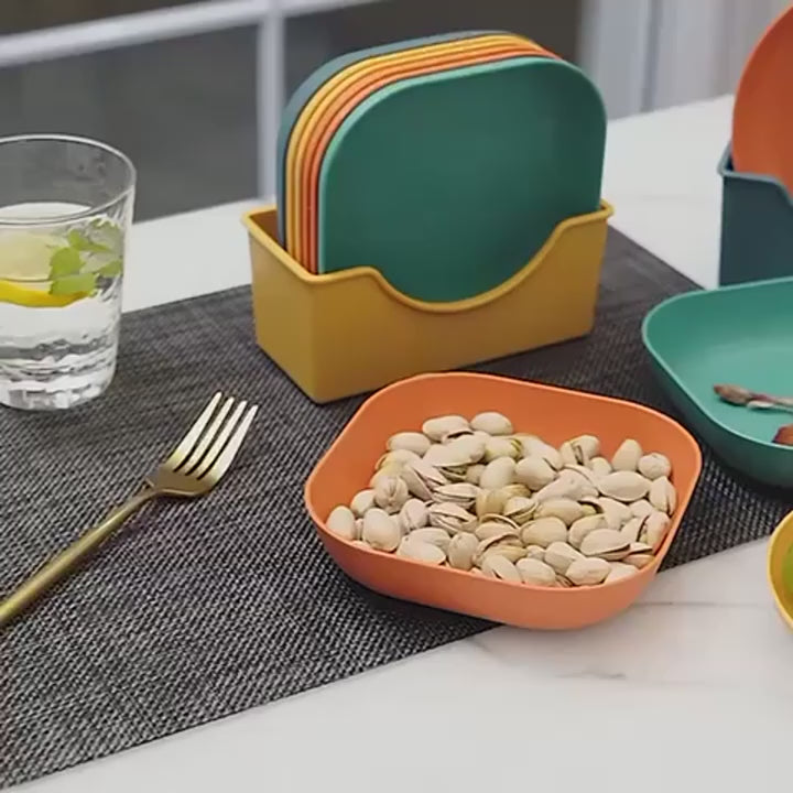 Set of colorful plates featuring different edibles